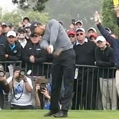 Tiger Woods’ follow-through, arms and club extended out towards target